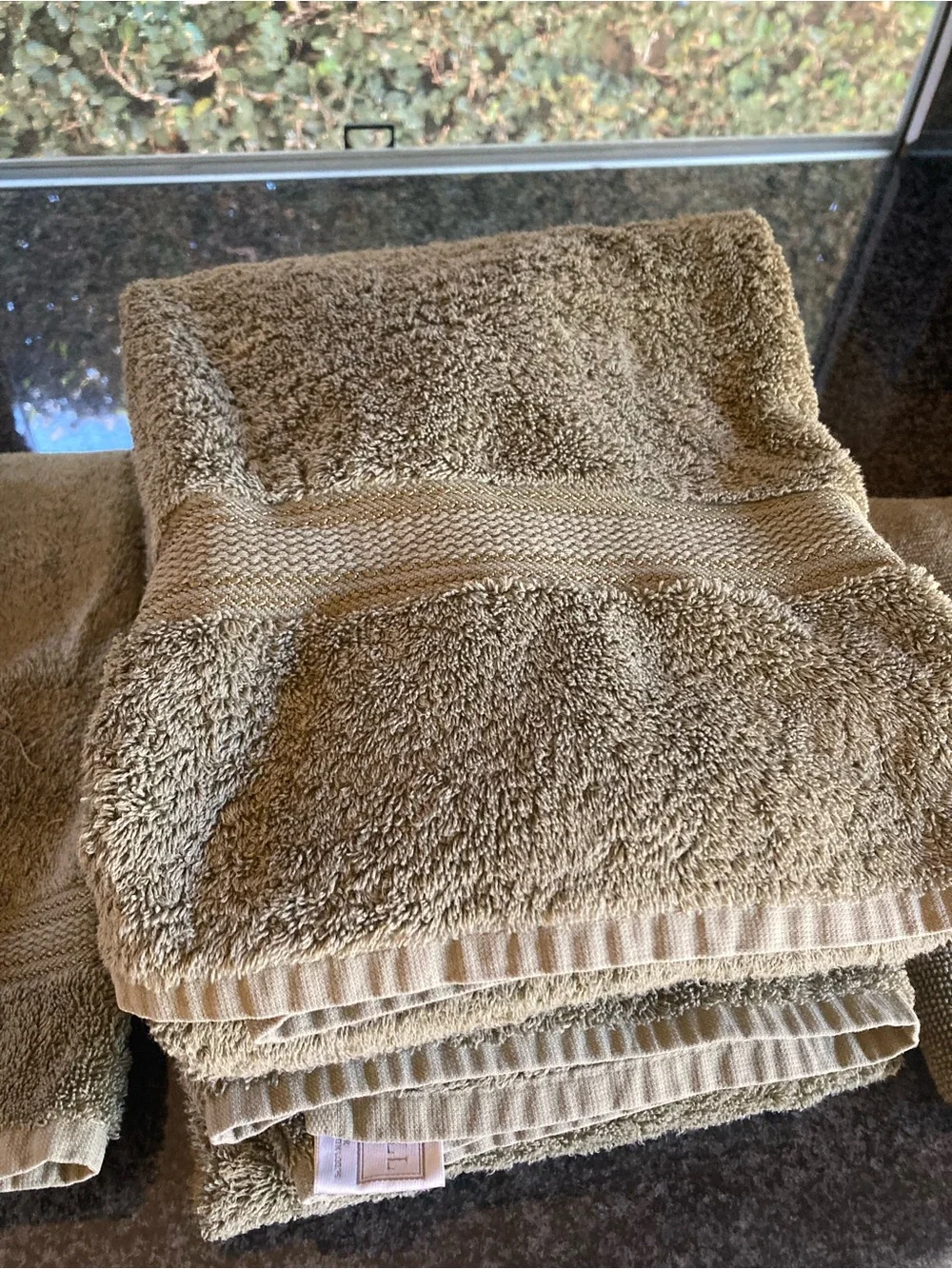 2 Croscill towels, 3 hand towels and 1 bath mat.